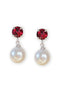 Pair of earrings with red gemstones and pearl drops on a white background
With ruby red crystal round studs about 8mm in size.