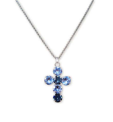Austrian crystal cross pendant necklace on white backround.The cross is 32 long made with light blue and navy blue crystals.The chain is stainless steel tarnish resistant .The chain length is 43cm and has additional extension chain to adjust.