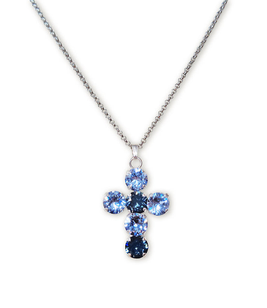Austrian crystal cross pendant necklace on white backround.The cross is 32 long made with light blue and navy blue crystals.The chain is stainless steel tarnish resistant .The chain length is 43cm and has additional extension chain to adjust.