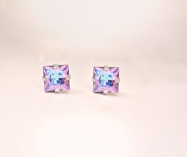 Square stud earrings made with Austrian crystal.These are square stud earrings 8mm size in colour vitrail light which is purple with light blue hues .They are silver plated nickel free.Elegant square earrings
