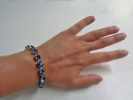 Austrian crystal tennis bracelet denim blue ,rhodium silver