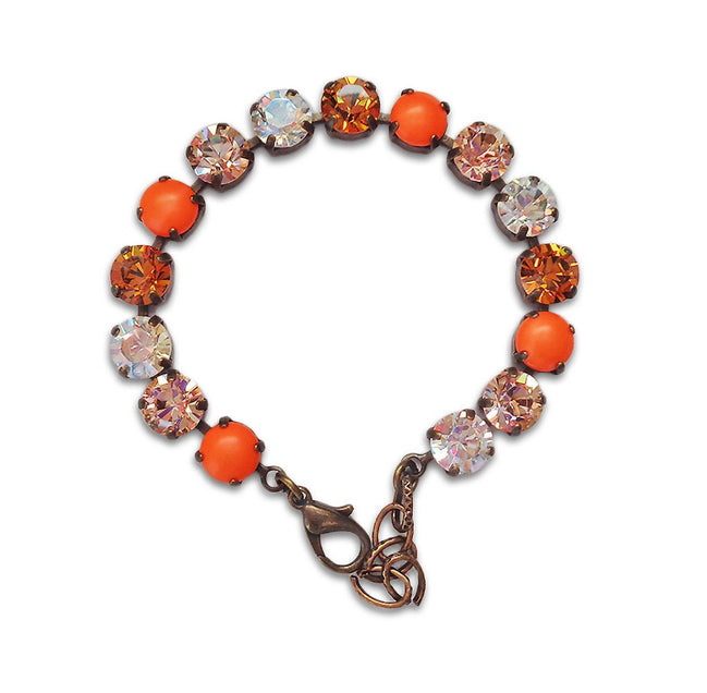 Bracelet style tennis en cristal Swarovski 8 mm avec pierres fantaisie multicolores topaze, cristal transparent et perles orange fluo.