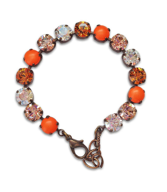 Bracelet style tennis en cristal Swarovski 8 mm avec pierres fantaisie multicolores topaze, cristal transparent et perles orange fluo.