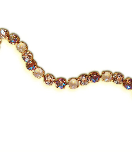 Crystal tennis bracelet beige and topaz,yellow gold