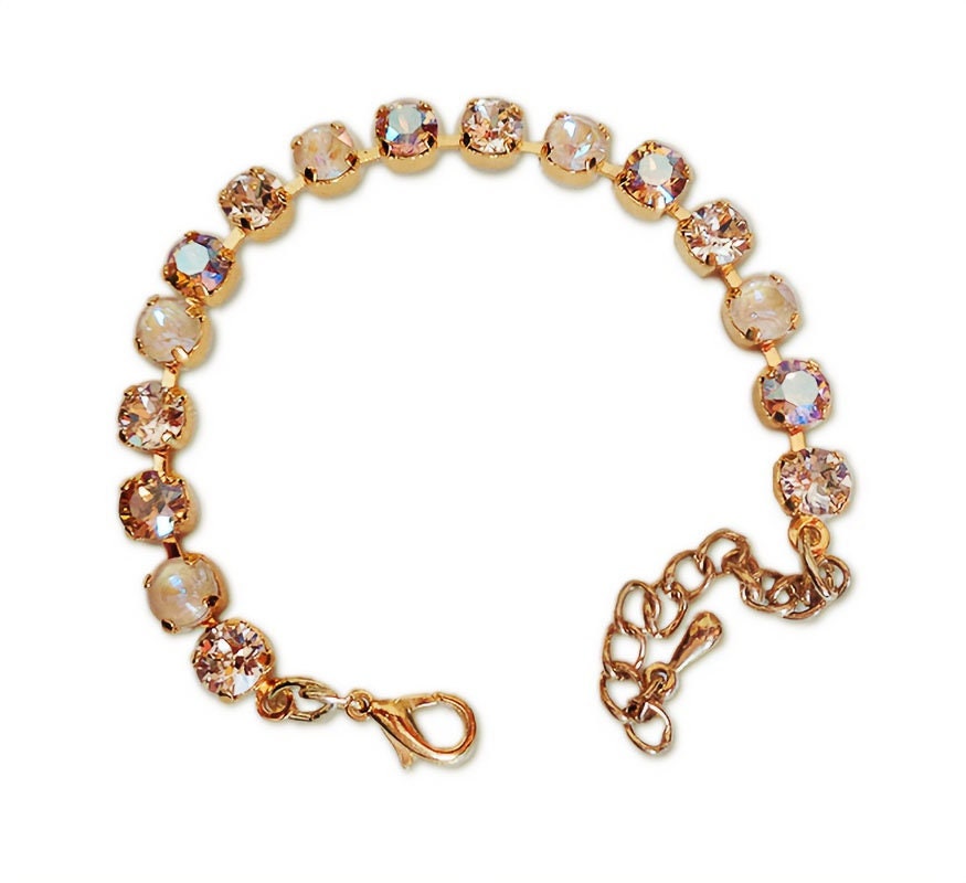 Crystal tennis bracelet beige and topaz,yellow gold