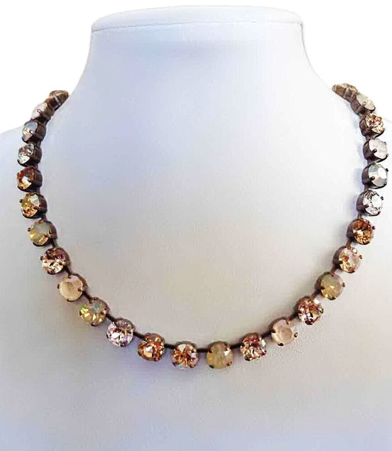 PETRA Crystal tennis necklace golden and gray tones ,antique brass