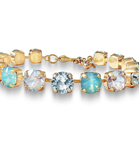 Austrian crystal  tennis bracelet  pastel blue,clear, gold plated