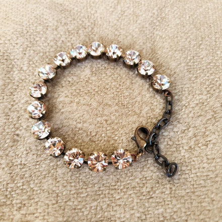 Austrian crystal tennis style bracelet  silk ,antique brass