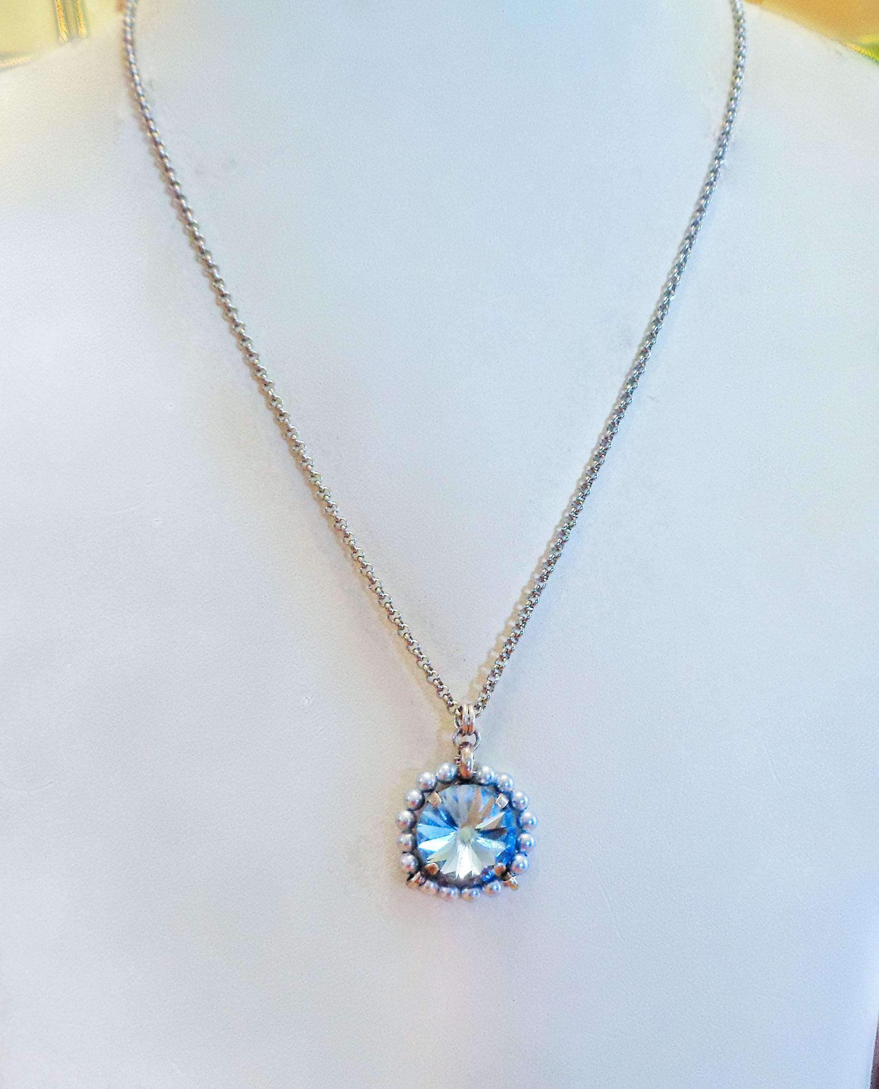 Crystal and pearl round pendant necklace aquamarine
