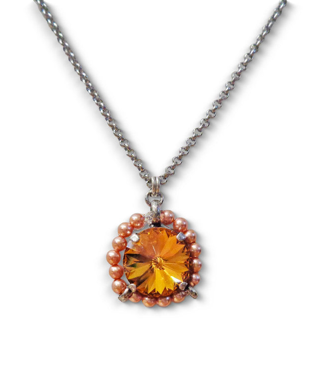 Crystal and pearl round pendant necklace topaz