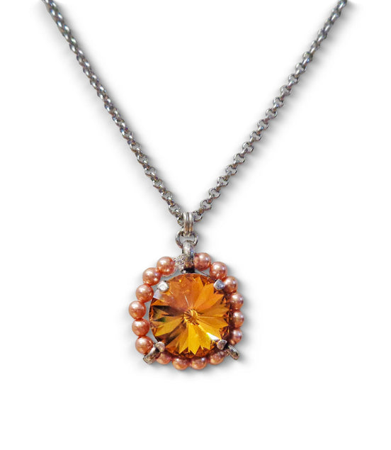 Crystal and pearl round pendant necklace topaz
