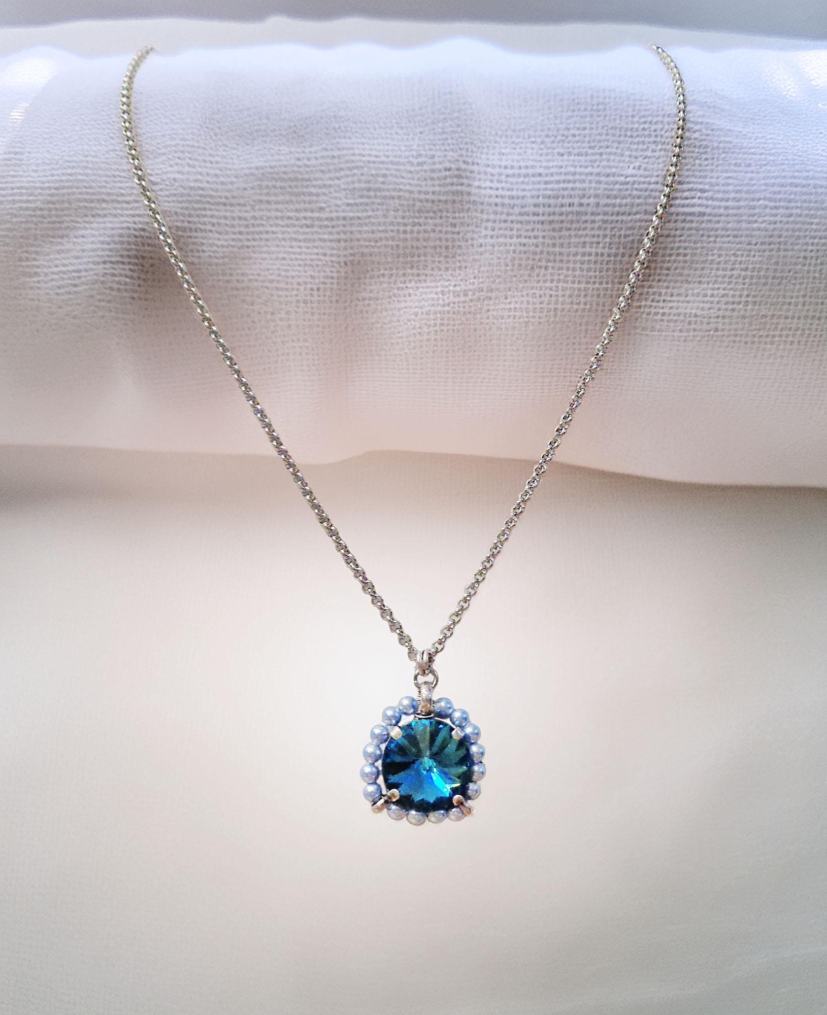 Crystal and pearl round pendant necklace blue indicolite