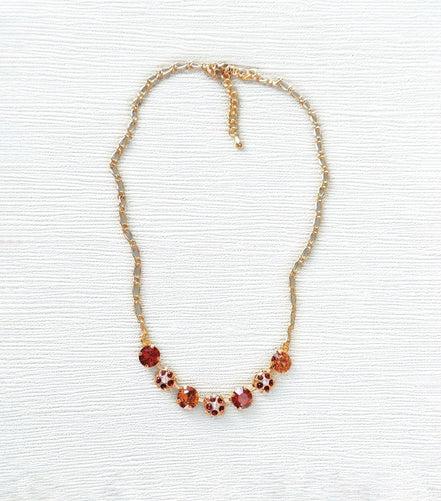 Crystal chain decorated necklace indian red and topaz,gold plated