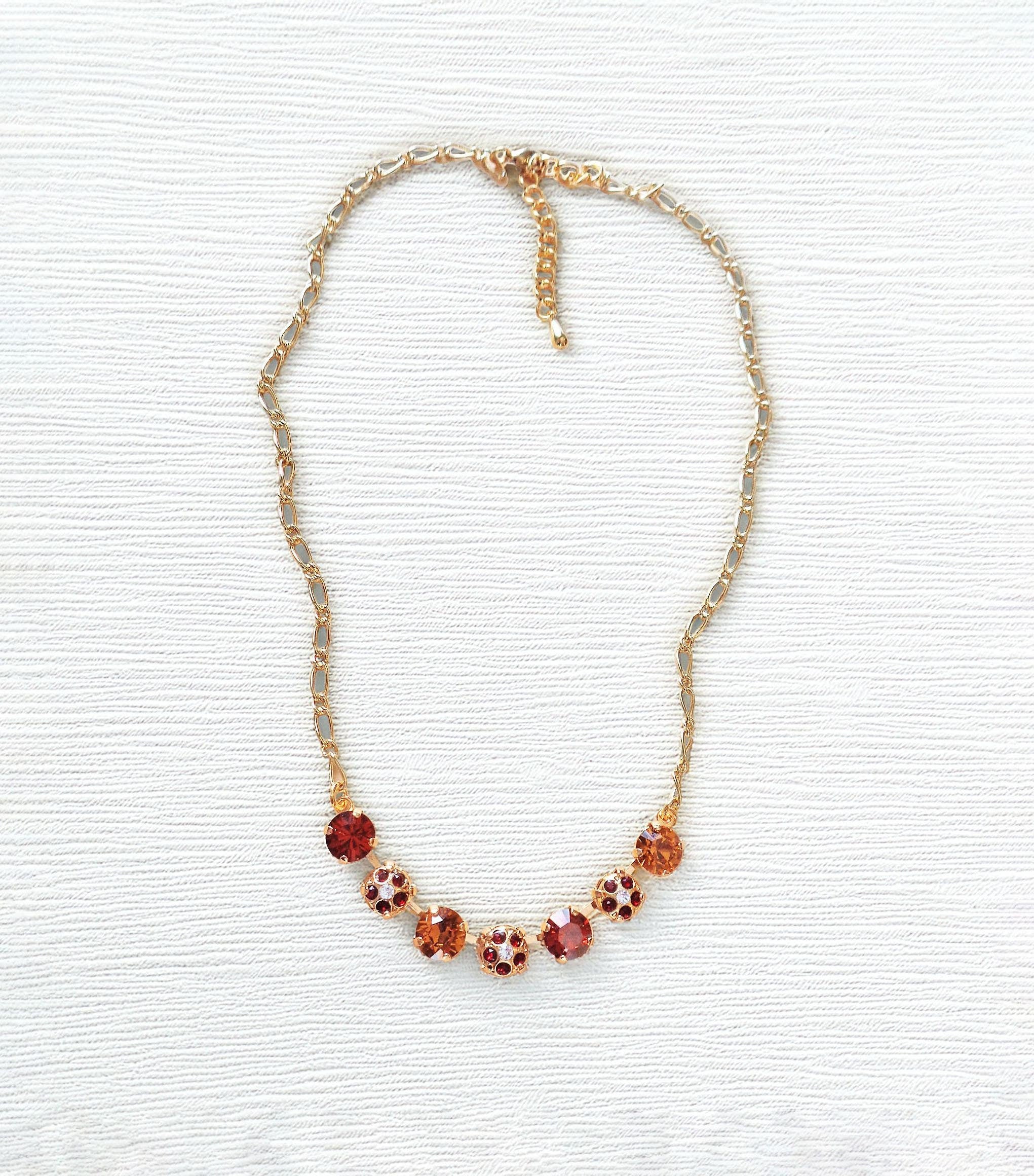 Crystal chain decorated necklace indian red and topaz,gold plated