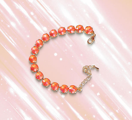 Austrian crystal tennis bracelet orange glow delite,yellow gold