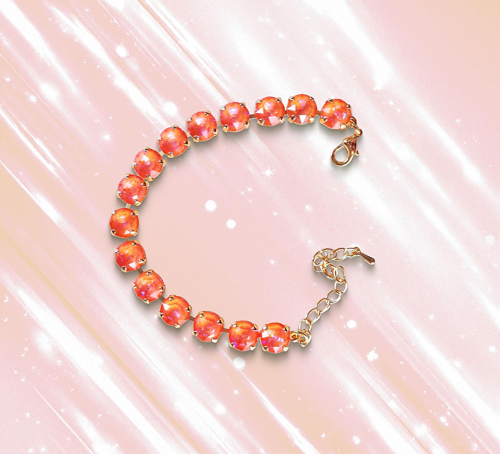 Austrian crystal tennis bracelet orange glow delite,yellow gold