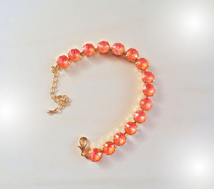 Austrian crystal tennis bracelet orange glow delite,yellow gold