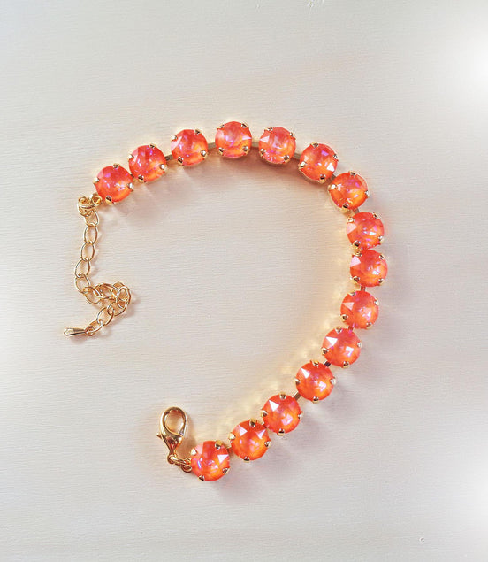 Austrian crystal tennis bracelet orange glow delite,yellow gold
