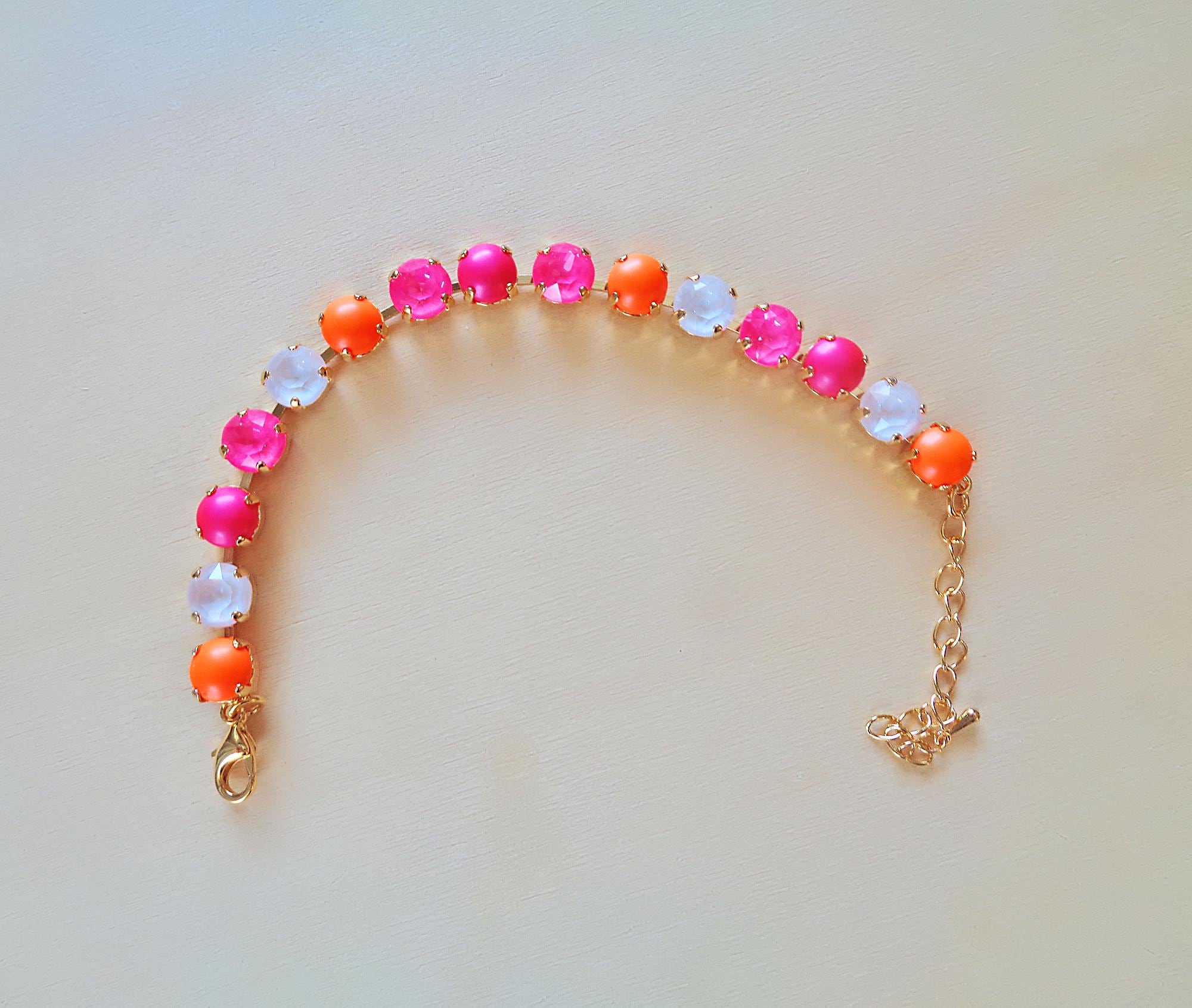 Austrian crystal  and pearls  bracelet neon pink ,neon orange,gold plated