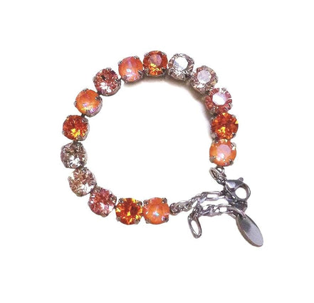 Austrian crystal tennis bracelet  orange and peach ,rhodium silver