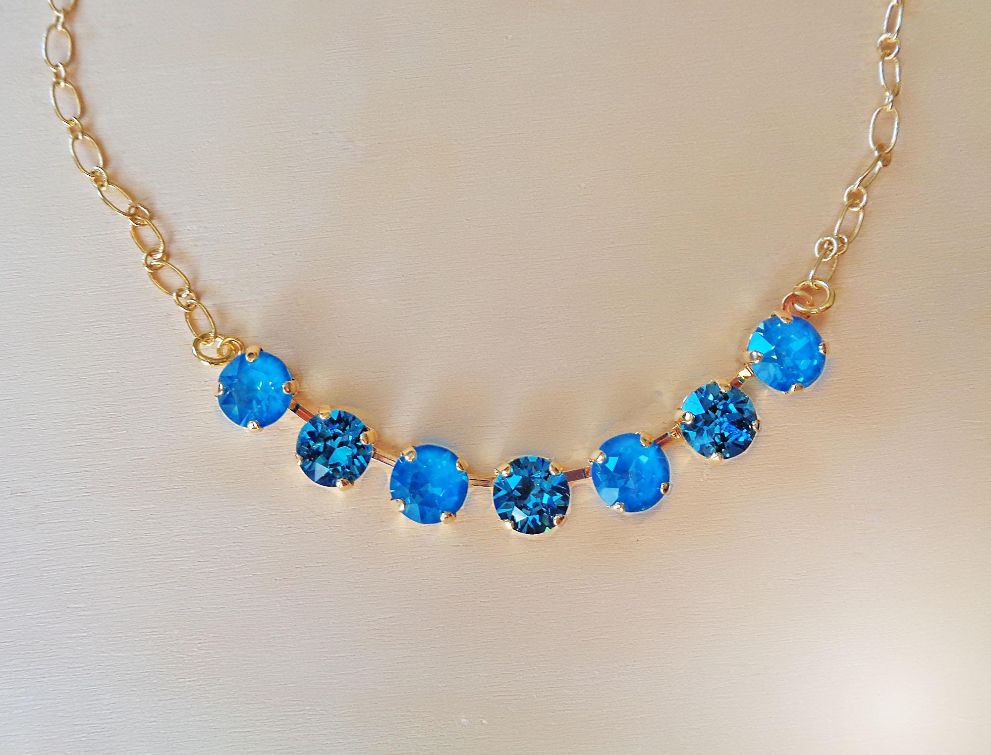 Austrian crystal gold plated chain necklace ,teal blue